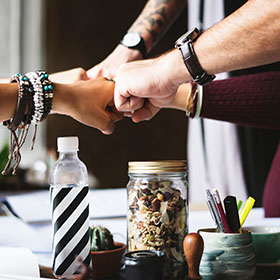 Group Fist bumping